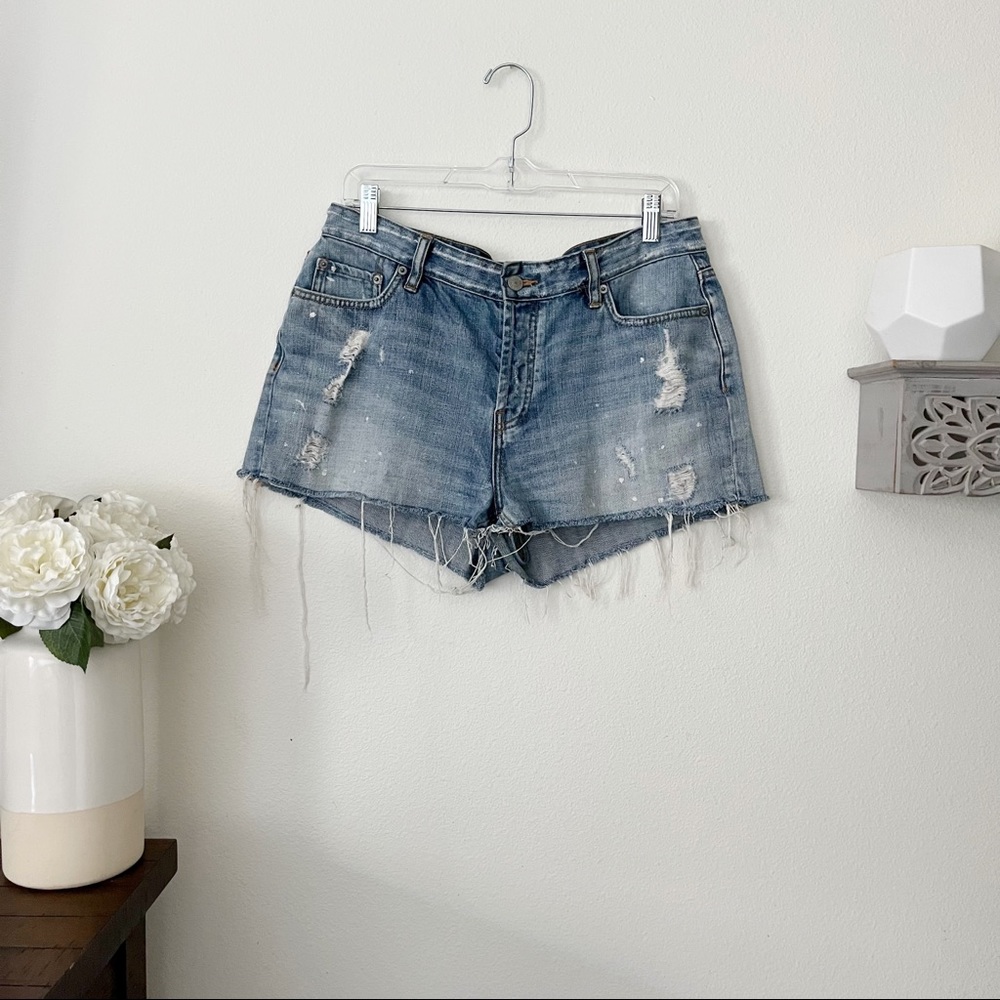 Rails cut off jean shorts with paint splatter and distressing size 30/US 10